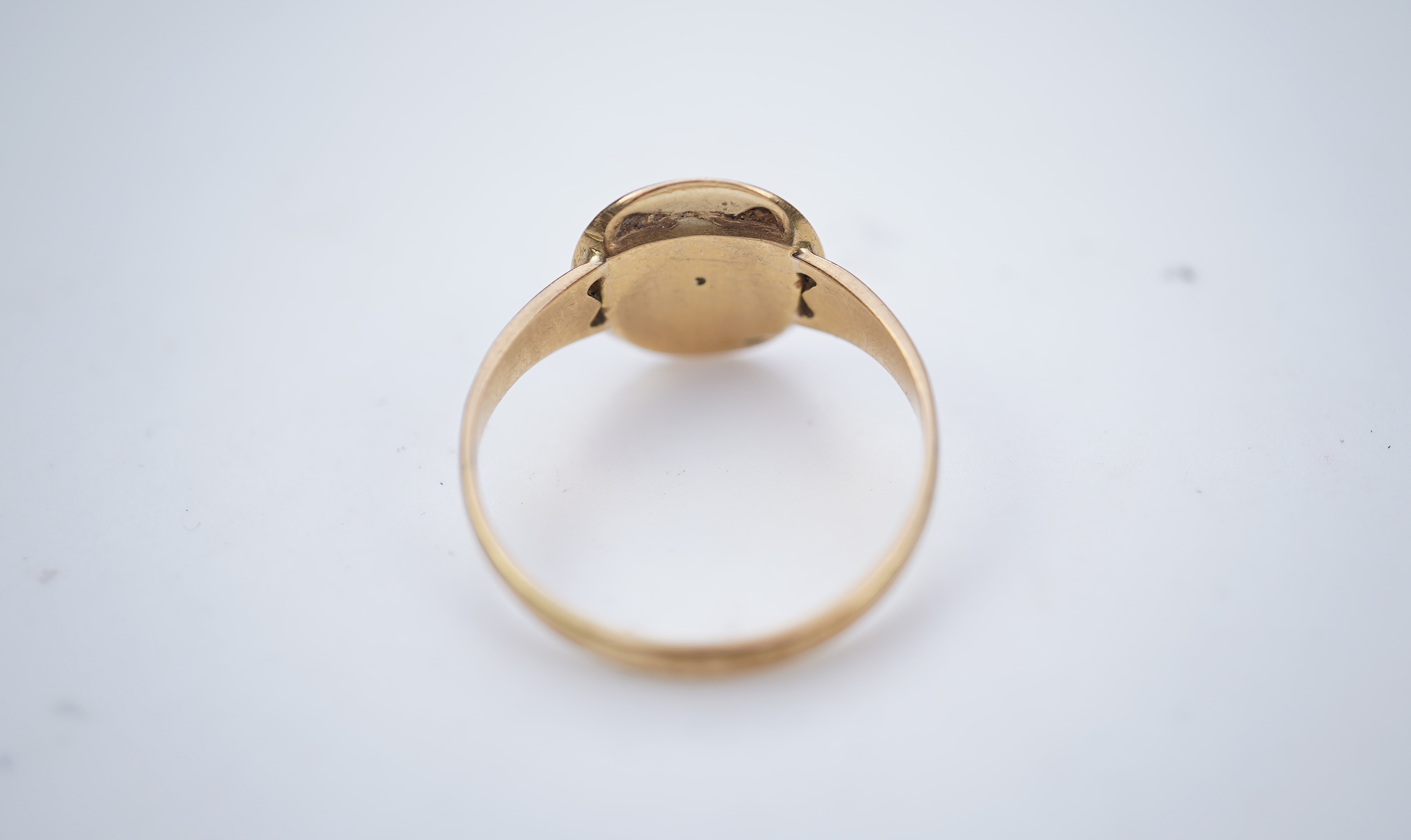 A gold, enamel and diamond signet ring, circa 1900